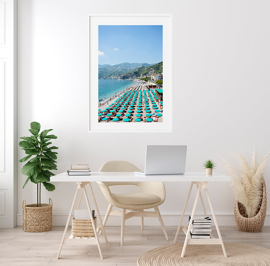 Amalfi Beach photographic print featuring the beautiful beach with its green umbrellas and beach goers on a summer day on the Amalfi Coast