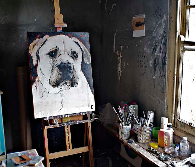 Cassie Thring's painting of Hugo the dog sits on the easel in her studio